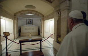 Pope Francis prays at the tomb of Pope Pius XII on Nov. 2, 2021. Vatican Media.