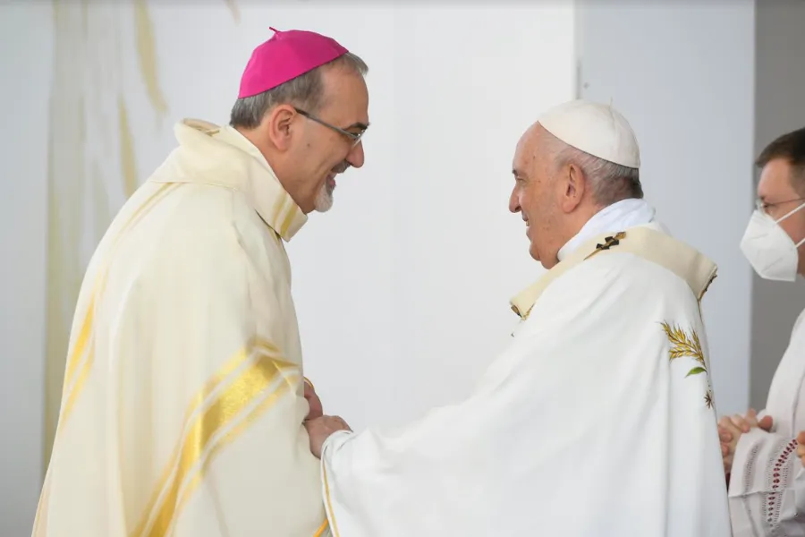 Pope Francis greets Latin Patriarch Pierbattista Pizzaballa of Jerusalem at a Mass at the GSP Stadium in Nicosia, Cyprus, Dec. 3, 2021.?w=200&h=150