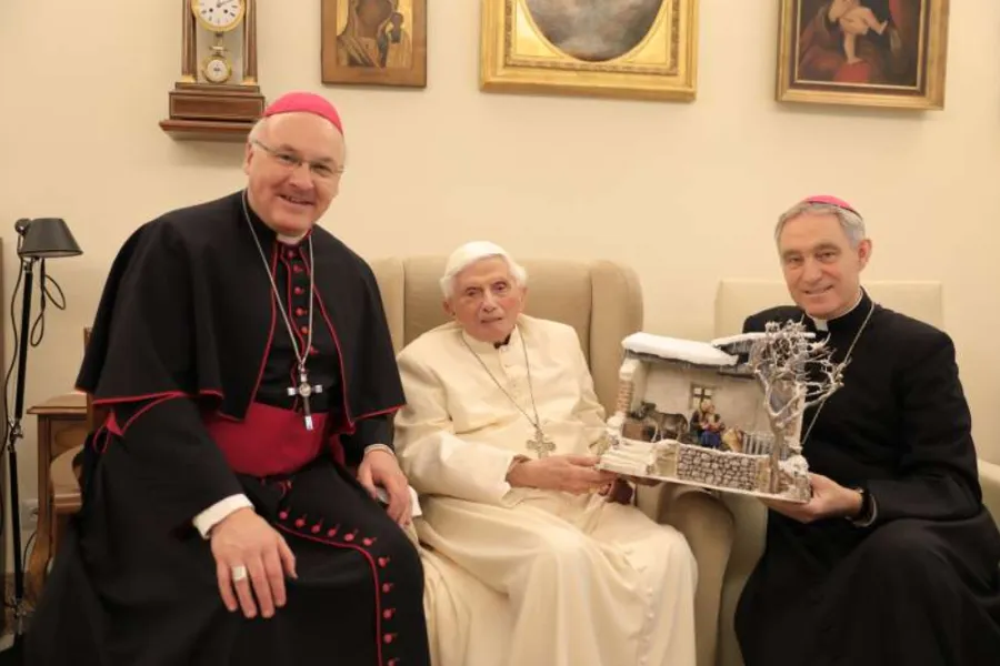 Bishop Rudolf Voderholzer, Pope emeritus Benedict XVI, and Archbishop Georg Gänswein with the nativity scene on Dec. 8, 2021.?w=200&h=150