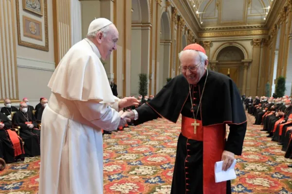 Pope Francis greets Cardinal Giovanni Battista Re. Vatican Media.