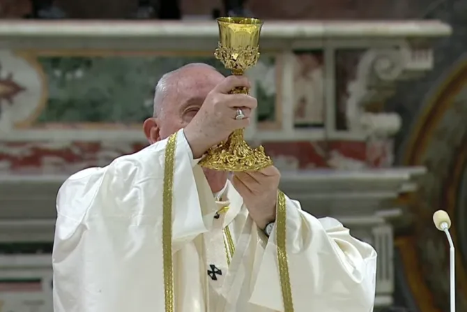Pope Francis celebrates Mass with the baptism of infants in the Sistine Chapel on Jan. 9, 2021