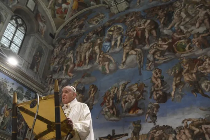 Pope Francis celebrates Mass with the baptism of infants in the Sistine Chapel on Jan. 9, 2021