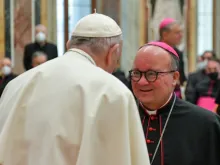 Pope Francis greets Archbishop Charles Scicluna.