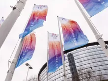 ‘Synodal Way’ flags fly in front of the Congress Center Messe Frankfurt in Germany.