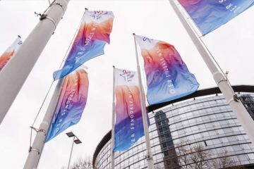 ‘Synodal Way’ flags fly in front of the Congress Center Messe Frankfurt in Germany