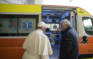 Pope Francis and Cardinal Konrad Krajewski with the ambulance bound for Ukraine. Vatican Media.