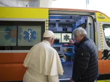 Pope Francis and Cardinal Konrad Krajewski with the ambulance bound for Ukraine.