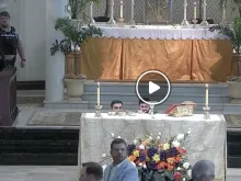 As parishioners and police respond to the threat of an armed intruder, clergy at St. Mary Magdalene Catholic Church in Abbeville, Louisiana take cover behind the altar on May 11, 2024.
