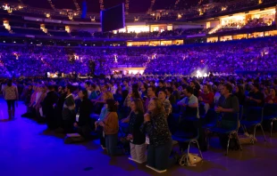 Approximately 24,000 people participate in Eucharistic adoration at the SEEK24 conference Jan. 3, 2024, in St. Louis. Credit: Jonah McKeown/CNA