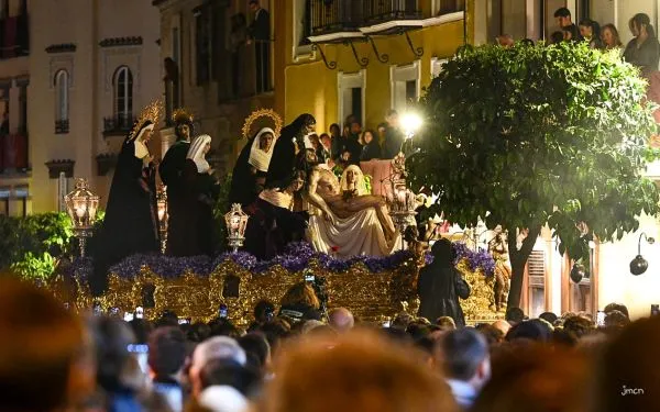 The Christ of Charity and the Virgin of Sorrows of the Brotherhood of Santa Marta processes through the streets of Seville, Spain, on Holy Monday, March 25, 2024. Credit: Joaquín Carmona