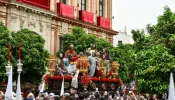 The Brotherhood of the Holy Supper processes through Seville, Spain, on Holy Monday, March 25, 2024.