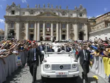 Pope Francis greets thousands of children and their families as he makes his way through St. Peter's Square during the first World Children's Day, Sunday, May 26, 2024.
