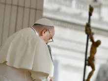 Pope Francis prays during his Wednesday general audience on Nov. 15, 2023.