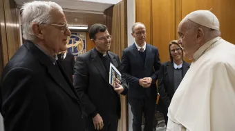 Pope Francis meets with Father Federico Lombardi, president of the Ratzinger Foundation and Vatican spokesman during Pope Benedict XVI’s pontificate (left), and the 2023 Ratzinger Prize recipients Father Pablo Blanco Sarto (center) and Professor Francesc Torralba (right) at the Vatican on Nov. 30, 2023.