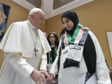 Pope Francis meets with relatives of Palestinians living in Gaza on Nov. 22, 2023.