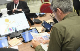A delegate participates in round-table discussions at the Synod on Synodality, Oct. 10, 2023. Credit: Vatican Media