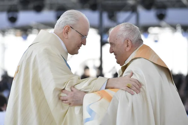 Pope Francis and Cardinal Peter Erdő, the archbishop of Budapest (left), are shown at the outdoor Mass held in Budapest, Hungary, on April 30, 2023. Erdő was the principal celebrant of the Mass; since the pope’s knee injury has impeded his mobility, he has called on cardinals to take his place at the altar. Vatican Media