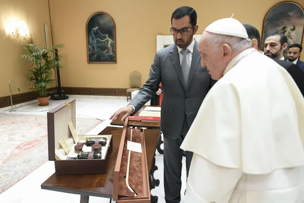 President-Designate of COP28 Dr. Sultan Al Jaber, from the UAE, presents Pope Francis with a gift at a meeting on Wednesday, Oct. 11, 2023, at the Vatican. Credit: Vatican Media