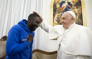 Pope Francis meets with 30-year-old Mbengue Nyimbilo Crepin, who shared his story during a meeting at the pope’s Vatican City residence Casa Santa Marta on Nov. 17, 2023. Credit: Vatican Media