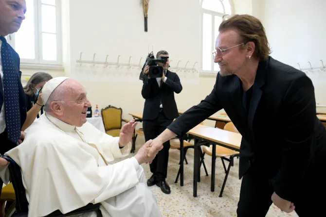 Pope Francis meets Bono at the launch of the Scholas Occurrentes International Educational Movement at the Pontifical Urban University in Rome, May 19, 2022