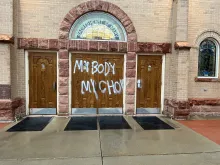 Pro-abortion graffiti on the doors of Sacred Heart of Mary Catholic Church in Boulder, Colorado, on May 4, 2022.