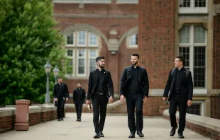 Seminarians chat as they walk along the promenade in front of Sacred Heart Major Seminary in Detroit. Starting in the fall semester of 2024, first-year seminarians at Sacred Heart and seminaries across the country will undertake a "propaedeutic" year focused on personal, spiritual, and relationship growth, limiting the use of technology while spending more time in prayer and communion with others. Credit: Photos by Marek Dziekonski | Special to Detroit Catholic