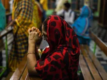 An Indian Christian prays in Eluru, Andhra Pradesh.