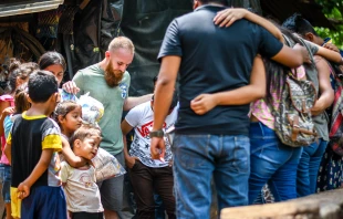 A Christian mission team is pictured praying in Guatemala in 2019. Credit: Shutterstock