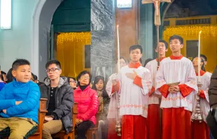 Catholics celebrate Christmas Mass at the Nativity of Our Lady Church on Dec. 24, 2019, in Macau, China. Credit: Kit Leong/Shutterstock