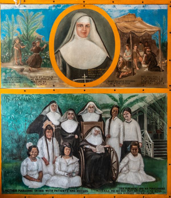 Painting of nun Saint Marianne Cope and images with lepers and her team on Molokai Island at Mary, Star of the Sea, Catholic Church, Kalapana, Hawaii. Claudine Van Massenhove / Shutterstock