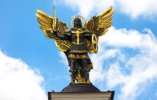 A sculpture of Archangel Michael atop the Lach Gates at Independence Square in Kyiv, Ukraine. S-F/Shutterstock.