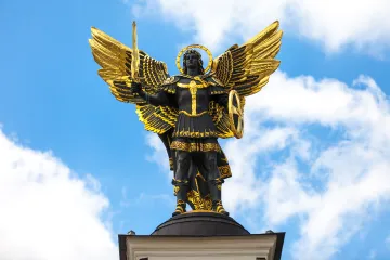 A sculpture of Archangel Michael atop the Lach Gates at Independence Square in Kyiv, Ukraine