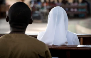 Catholics attend Mass in Ho, Ghana. James Dalrymple via Shutterstock.