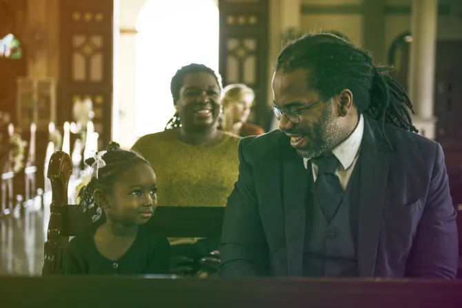 Black Catholic Father and Daughter