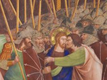 Judas betrays Jesus with a kiss, 14th-century fresco in the Collegiata of San Gimignano, Italy.