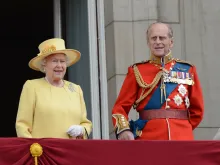 Queen Elizabeth II and the Duke of Edinburgh attend the Trooping of the Colour in London, England, June 16, 2012.