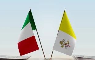 The flags of Italy and Vatican City. alexfan32 via Shutterstock.