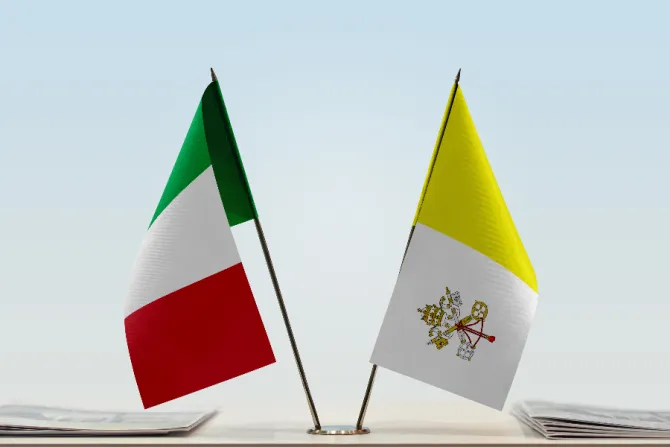 The flags of Italy and Vatican City