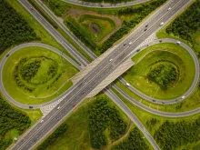 An aerial view of the M7 motorway and N18 national road junction on the outskirts of Limerick, Ireland.