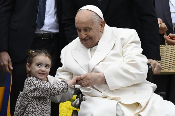 Pope Francis greets a young girl in St. Peter's Square during his general audience on April 3, 2024. Credit: Vatican Media