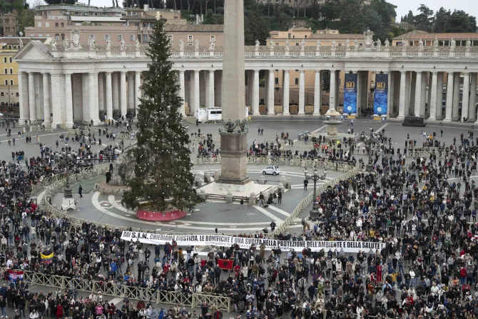A crowd gathers in St. Peter's Square to pray the Angelus with the pope on Christmas Eve.