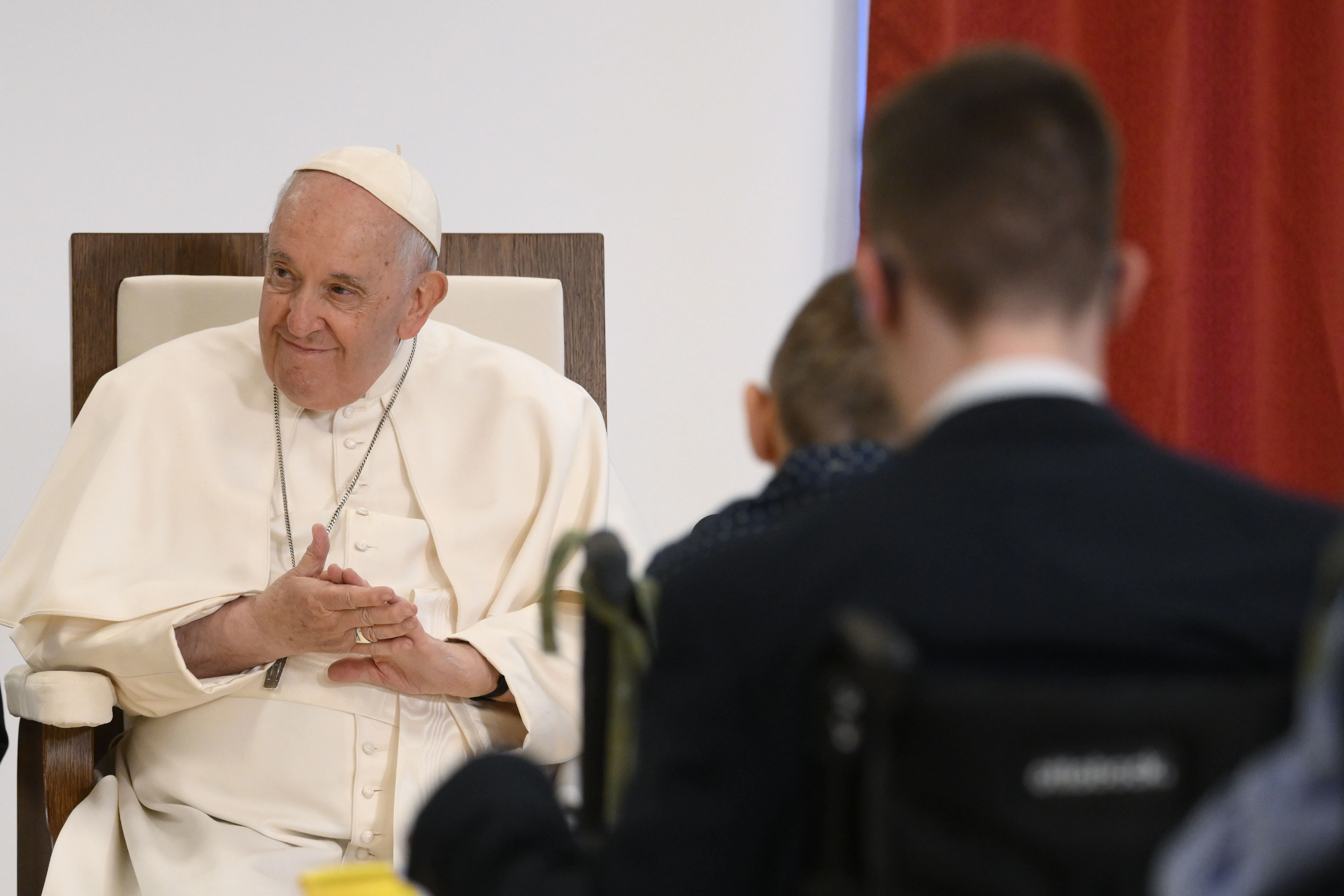 Pope Francis smiles during a meeting on April 29, 2023, with children and adults who are visually impaired and have other disabilities at a Catholic institute in Budapest, Hungary, dedicated to Blessed László Batthyány-Strattmann.?w=200&h=150