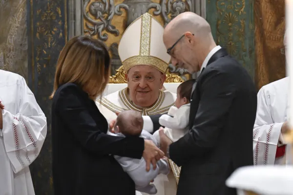 Pope Francis baptizes babies in the Sistine Chapel on Jan. 7, 2024. Credit: Vatican Media