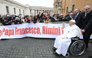 Pope Francis greets the faithful from his wheelchair during his Feb. 28, 2024, general audience at the Vatican. Credit: Vatican Media