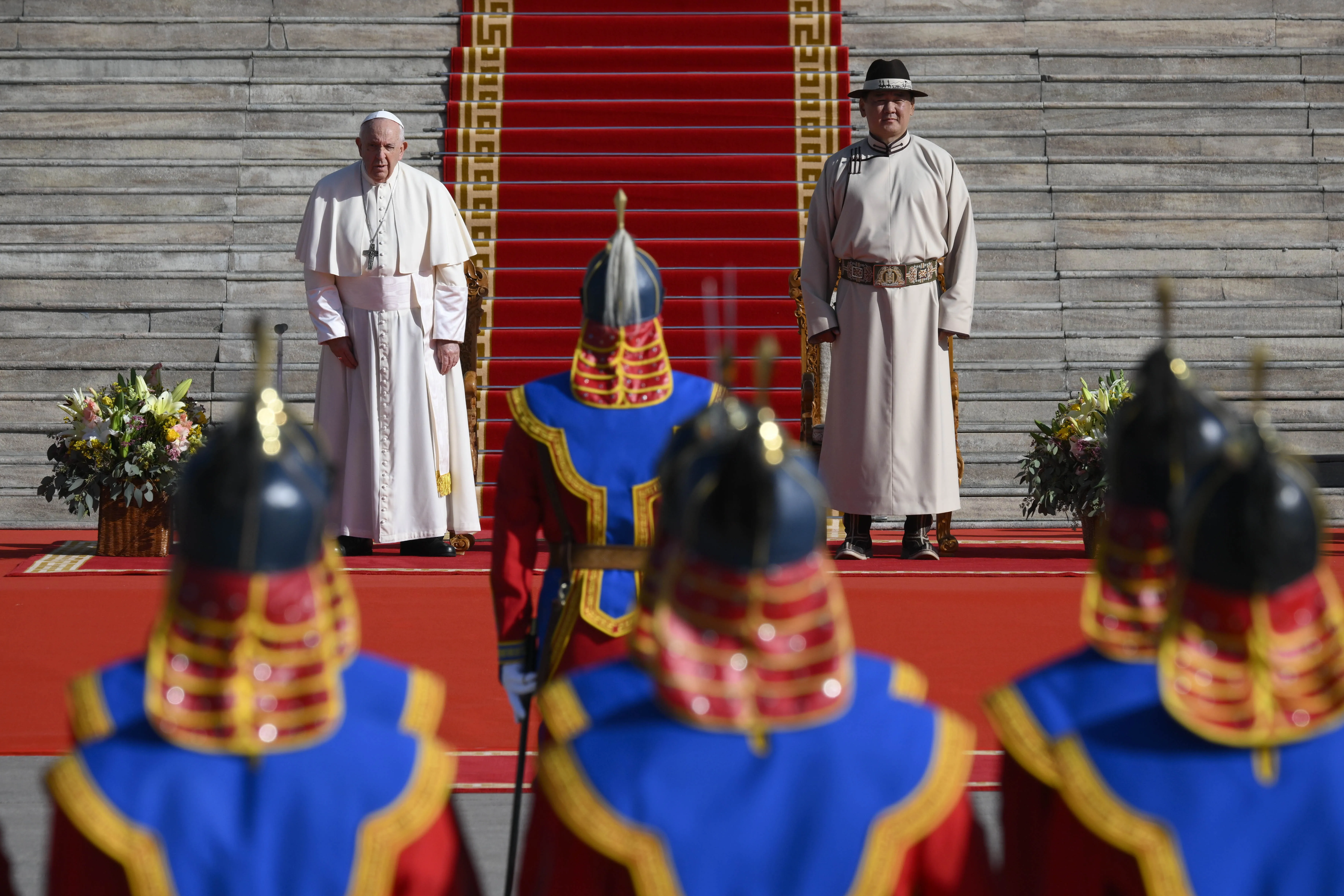 Pope Francis stands beside Mongolian President Ukhnaagiin Khürelsükh in Sukhbaatar Square in front of the State Palace in Ulaanbaatar on Sept. 2, 2023.?w=200&h=150