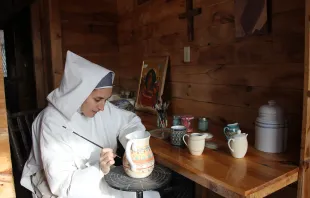 A religious sister from the Monastery of Bethlehem in Livingston Manor, New York, hand-paints a pitcher. Credit: Monastery of Bethlehem