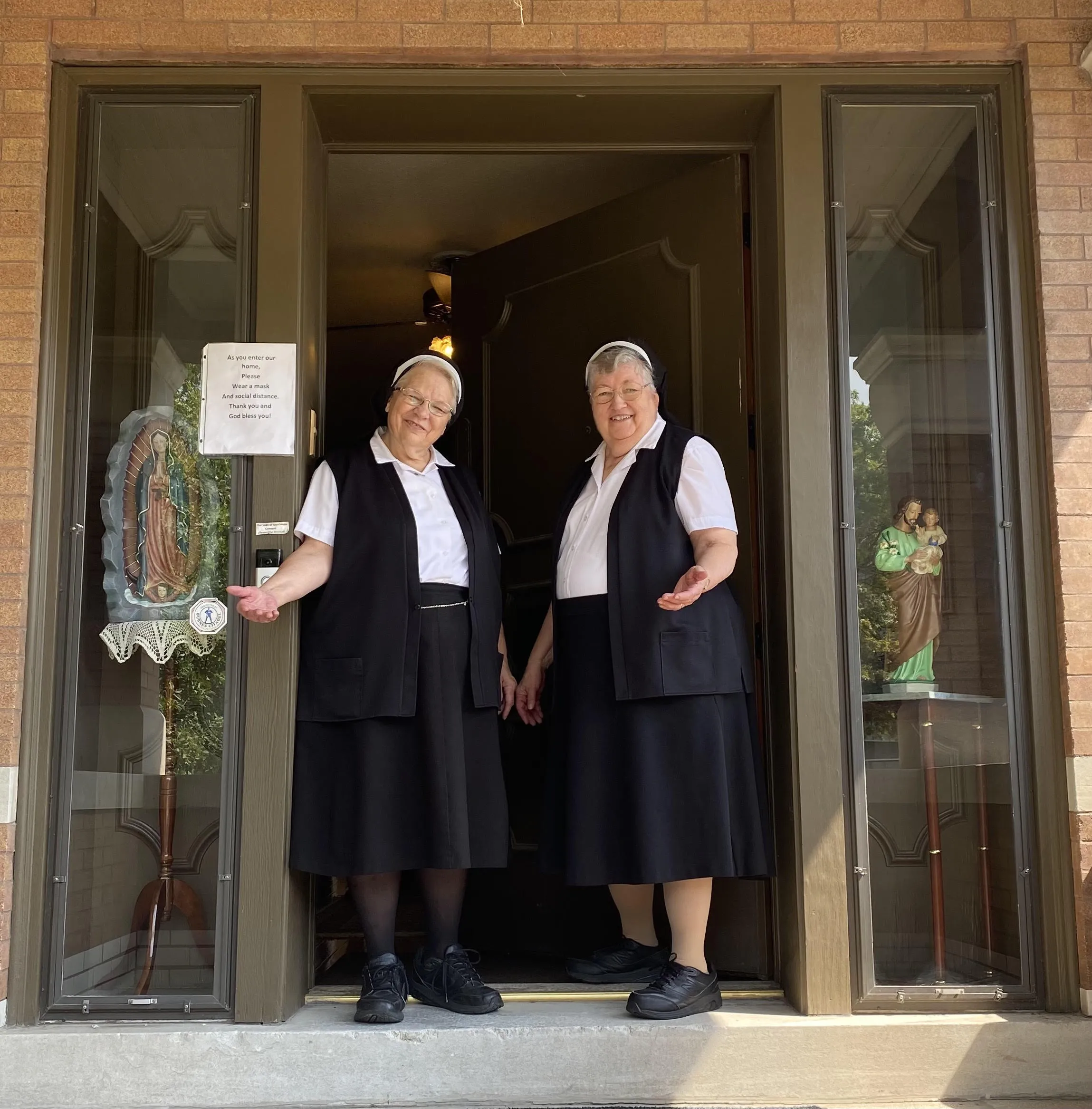 Sister Sue Ann Hall (left) and Sister Delores Vogt of the Franciscan Sisters of Christian Charity welcome visitors to Our Lady of Guadalupe convent in St. Louis.?w=200&h=150