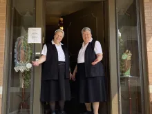 Sister Sue Ann Hall (left) and Sister Delores Vogt of the Franciscan Sisters of Christian Charity welcome visitors to Our Lady of Guadalupe convent in St. Louis.
