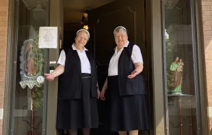 Sister Sue Ann Hall (left) and Sister Delores Vogt of the Franciscan Sisters of Christian Charity welcome visitors to Our Lady of Guadalupe convent in St. Louis. Archdiocese of St. Louis.