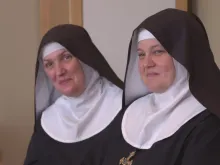 Sister Scholastica Radel (left) and Mother Abbess Cecilia Snell of the Benedictines of Mary, Queen of Apostles, discuss the recent exhumation of the order's foundress, Sister Wilhelmina Lancaster, in an interview with EWTN News In Depth on May 30, 2023, at their abbey in Gower, Missouri.